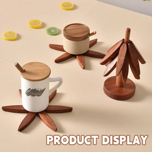 Solid walnut wood trivet set with snowflake coasters and a tree-shaped storage stand