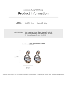 Detail view of irregular oval silver drop earrings with 12.3g weight and 3.6cm height