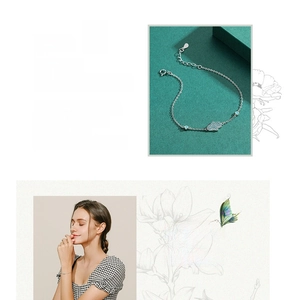 Macro view and model wearing a silver Hamsa hand bracelet with turquoise blue stones