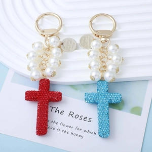Handmade beaded keychain with sparkling red and blue rhinestone cross pendants and pearls
