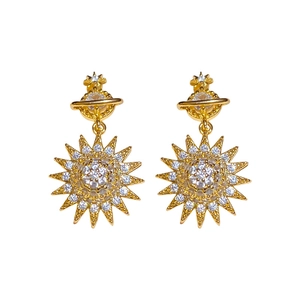 Elegant gold Saturn and sunburst stud earrings with sparkling cubic zirconia crystals