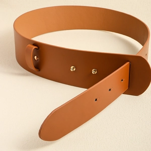 Detail view of a premium brown PU leather wide waist belt with golden metal buckles