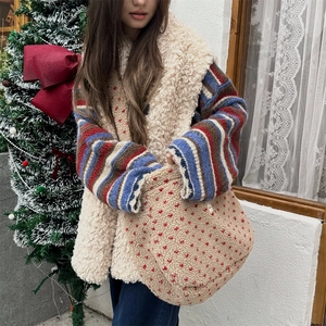 Winter plush crossbody bag featuring red heart patterns and soft fleece texture