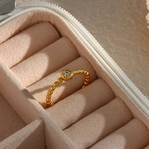18K gold plated stainless steel ring with zircon bead design in jewelry box