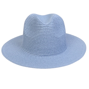 Close-up of the detailed blue woven texture and fine mesh on a summer straw sun hat
