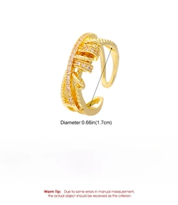 Detail view of a gold double-layer cross ring with dimensions and copper material info