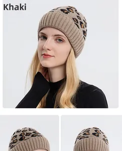 Close-up of leopard print knitted beanie in khaki featuring premium ribbed texture and warmth