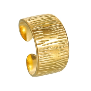 Detailed view of wide 18K gold plated stainless steel ring with textured surface