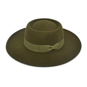 Detail of dark olive green wool felt hat with wide brim and grosgrain ribbon band