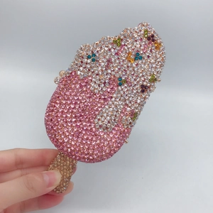 Detailed close-up of ice cream clutch bag featuring colorful hand-set sparkling rhinestones