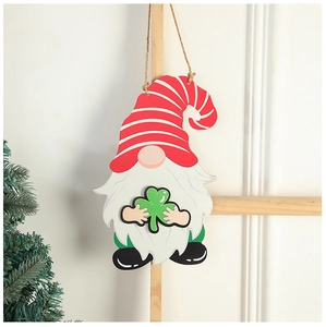Detail of wooden gnome ornament with red striped hat and clover for Christmas decor