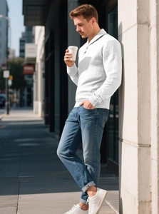 Detail of white waffle texture on men's polo shirt with buttoned collar and long sleeves