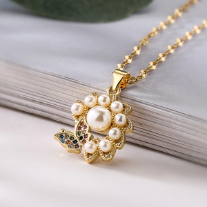Elegant gold pearl flower necklace with colorful zircon butterfly pendant for women