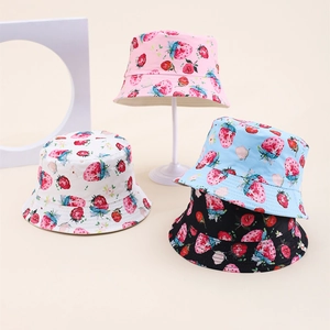 Kids strawberry print bucket hats in pink blue black and white for sun protection