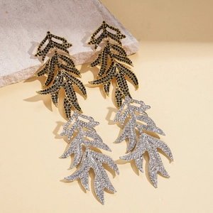 Boucles d'oreilles feuilles vintage dorées et argentées serties de cristaux sur pierre