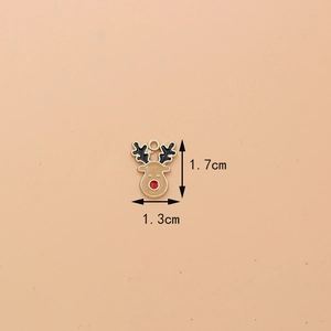 Detailed view of reindeer metal pendant with dimensions 1.7cm height and 1.3cm width