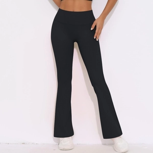 Detail of black high-waisted yoga pants showing flare cut and push-up lifting effect