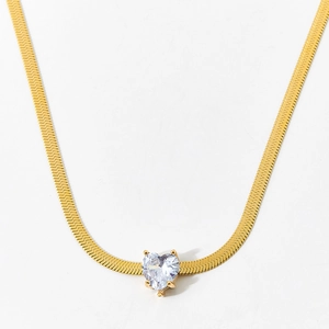 Golden snake chain necklace featuring a minimalist heart-shaped white zircon stone pendant