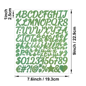 Close-up of 1-inch green glitter alphabet stickers with precise measurements labels