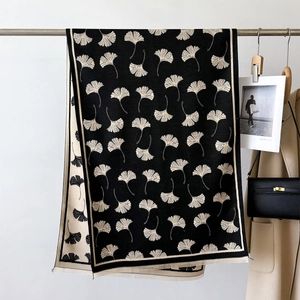 Thick warm cashmere-like scarf with ginkgo leaf pattern and delicate tassels