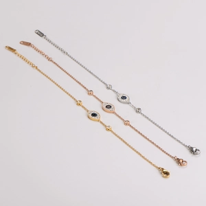 Drei Edelstahl-Armbänder mit bösem Blick in Gold, Roségold und Silber-Finish