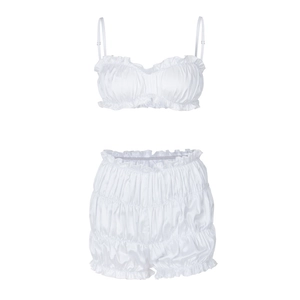 Detailed view of white pleated ruffles on camisole and matching shorts set