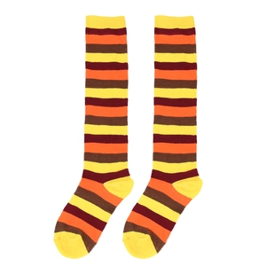 Detailed view of yellow, orange and brown striped knee-high knitted cotton socks