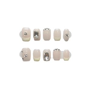 Handmade clear pink French press-on nails set with sparkling crystals and rhinestones