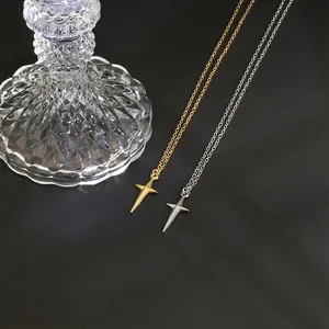 Minimalist stainless steel cross star necklaces in gold and silver on crystal base
