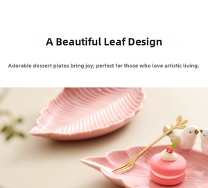 Macro detail of leaf-shaped ceramic dessert plate with delicate vein texture and gold bird
