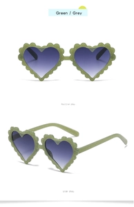 Detail of green glitter heart sunglasses with gradient grey lenses from front and side view