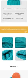 Detailed knit texture of thick double-layer wool cashmere beanie in teal and orange