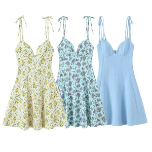 Detailed comparison of floral and solid poplin sundresses with slim shoulder straps
