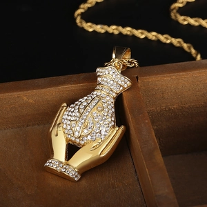 Gold hip hop money bag pendant necklace with diamonds on a premium jewelry box
