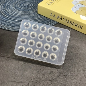Transparent silicone palette mold with 18 circular slots for nail art and DIY resin work