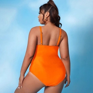 Vibrant orange one-piece swimsuit with adjustable straps and backless design for women