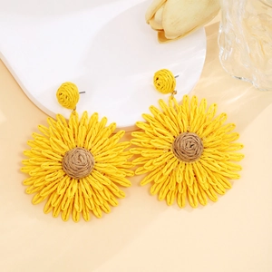 Handmade raffia sunflower drop earrings with yellow petals and brown center for summer