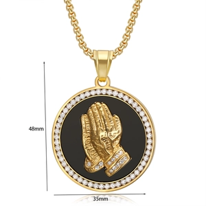 Detailed macro shot of gold plated hiphop prayer hand pendant with zircon inlay dimensions