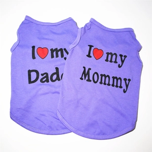 Detail view of purple cotton puppy vests with I love my Dad and Mommy printed text