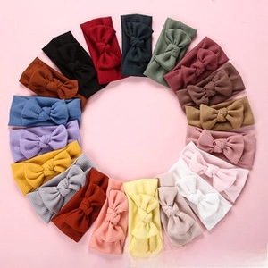 Detailed collection of colorful waffle knit baby headbands with large soft bows