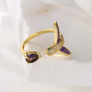 Adjustable 18K gold plated bird ring with purple enamel and sparkling zircon stones