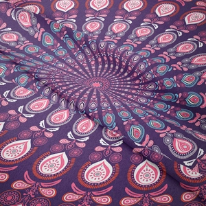Bohemian mandala tapestry with intricate purple and pink floral patterns for room decor