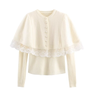 Elegant beige two-piece knit top with white lace shawl overlay and pearl buttons