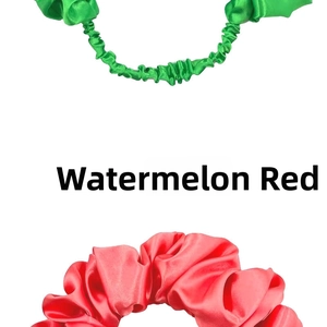 Detail view of satin pleated scrunchies in bright green and watermelon red colors