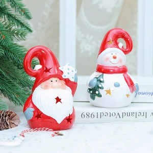 Hollow ceramic Christmas Santa and snowman tealight holders for holiday table decor