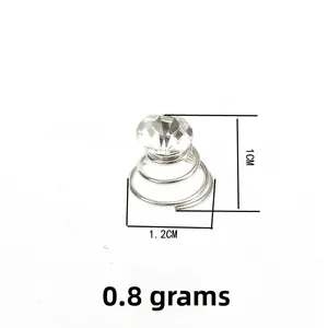 Macro shot of silver spiral hair screw pin with clear crystal rhinestone for bridal hair