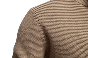 Detail of camel rib-knit texture and stand collar shoulder on a men's business sweater