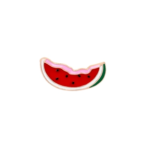 Detailed enamel watermelon slice brooch pin with vibrant red core and golden metal base