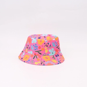 Detailed close-up of a pink sun hat for kids featuring vibrant floral patterns on white background