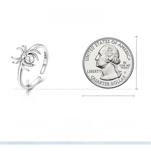 Size measurement of S925 silver spider ring next to a coin for scale reference